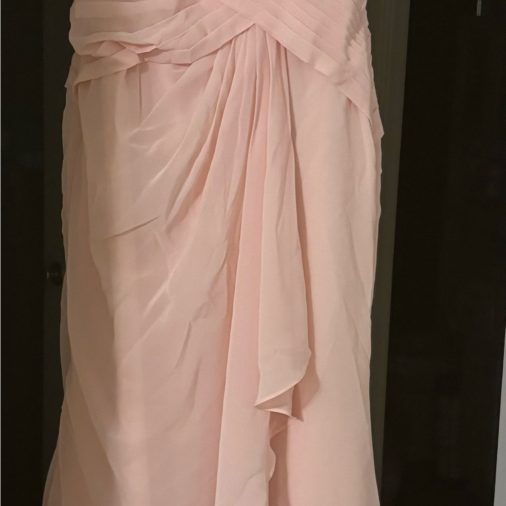 Good condition the dress is never been worn